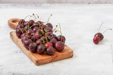 Close up of Fresh red cherries in glass bowl 