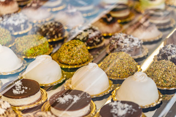 street food - small Sicilian pies displayed in a shop window 