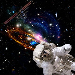 Astronaut flies in space. The elements of this image furnished by NASA.