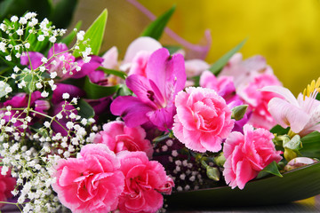 Composition with bouquet of freshly cut flowers