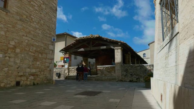 Entrance to the covered passage next to the Bagno Vignoni basin, Siena.