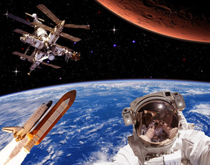 Astronaut, mars and rocket. The elements of this image furnished by NASA.