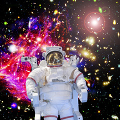 Astronaut and space, galaxies and stars. The elements of this image furnished by NASA.