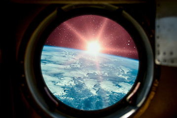 Sunrise, view from spaceship. Elements of this image furnished by NASA.