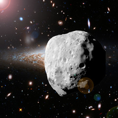 Asteroid flying in the deep space. Elements of this image furnished by NASA.