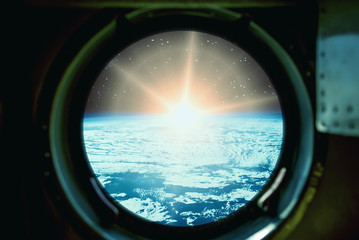 Sunrise, view from spaceship. Elements of this image furnished by NASA.