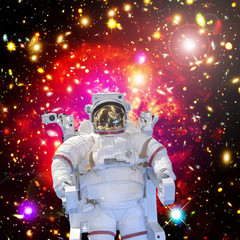 Astronaut and space, galaxies and stars. The elements of this image furnished by NASA.