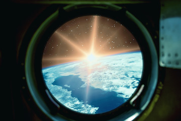 Fototapeta premium Sunrise, view from spaceship. Elements of this image furnished by NASA.