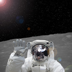 Fototapeta na wymiar Astronaut on the moon. Elements of this image furnished by NASA