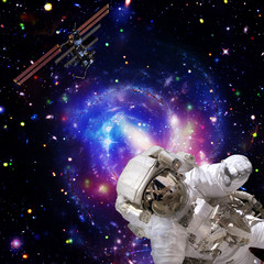 Astronaut flies in space. The elements of this image furnished by NASA.
