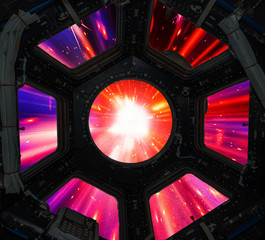 Hyper jump in in window of spaceship. Elements of this image furnished by NASA.