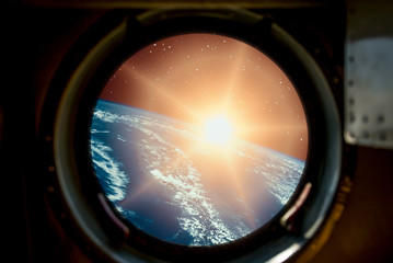 Sunrise, view from spaceship. Elements of this image furnished by NASA.