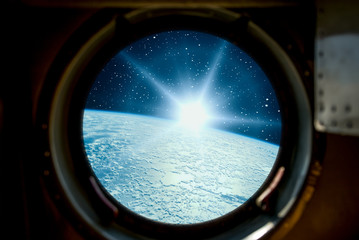 Sunrise, view from spaceship. Elements of this image furnished by NASA.