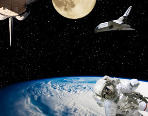 Astronaut, spaceships and moon. Earth on the backdrop. The elements of this image furnished by NASA.