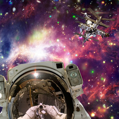 Astronaut and space station. Wonderful view of space. The elements of this image furnished by NASA.