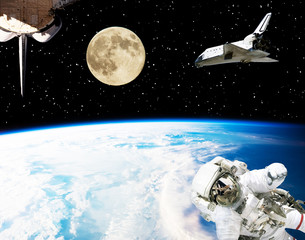 Astronaut, spaceships and moon. Earth on the backdrop. The elements of this image furnished by NASA.