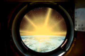 Sunrise, view from spaceship. Elements of this image furnished by NASA.