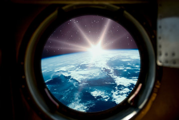 Sunrise, view from spaceship. Elements of this image furnished by NASA.