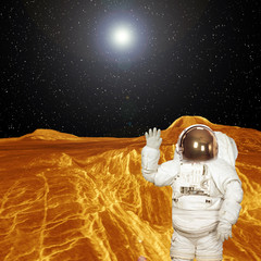 Astronaut posing on the strange extrasolar planet. The elements of this image furnished by NASA.