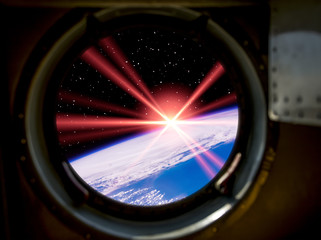 Beautiful sunrise from space. View from spacecraft. Elements of this image furnished by NASA.