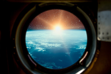 Sunrise, view from spaceship. Elements of this image furnished by NASA.