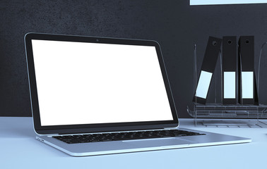 Modern designer desktop with laptop