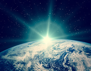 Sunrise on the planet earth. The elements of this image furnished by NASA.