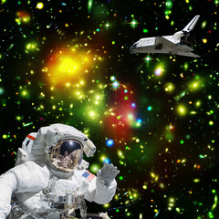 Obraz na płótnie Canvas Astronaut in outer space. Shuttle on the backdrop. The elements of this image furnished by NASA.