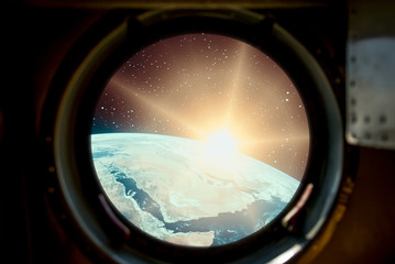 Sunrise, view from spaceship. Elements of this image furnished by NASA.
