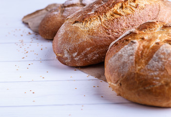 Freshly Baked Homemade Bread, close-up, isolated on a white background.