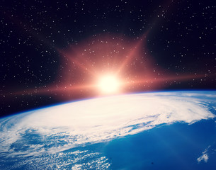 Sunflare and the earth from space. The elements of this image furnished by NASA.