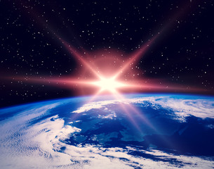 Space and sunrise. The elements of this image furnished by NASA.