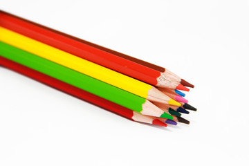 colorful wooden pencils for drawing on white background