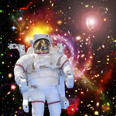 Astronaut and space, galaxies and stars. The elements of this image furnished by NASA.