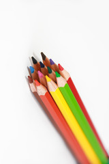 colorful wooden pencils for drawing on white background