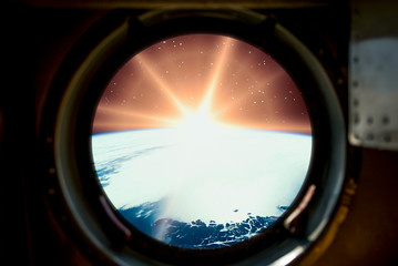 Sunrise, view from spaceship. Elements of this image furnished by NASA.