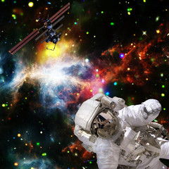 Fototapeta na wymiar Astronaut flies in space. The elements of this image furnished by NASA.