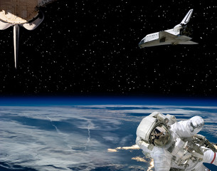 Astronaut and spaceships against earth. The elements of this image furnished by NASA.