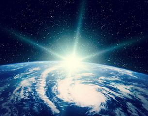 Earth from space during a sunrise. The elements of this image furnished by NASA.