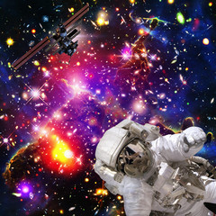 Fototapeta na wymiar Astronaut flies in space. The elements of this image furnished by NASA.
