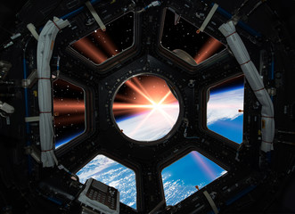 Beautiful sunrise from space. View from spacecraft. Elements of this image furnished by NASA.