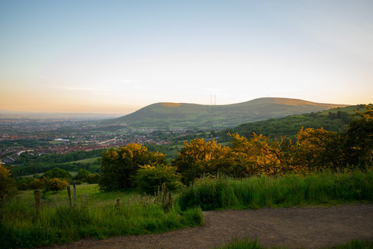 Colorful sunset at Cave Hill Country Park Belfast, Northern Ireland. Aerial view on City and hills 