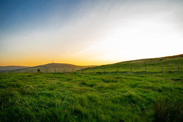 Colorful sunset at Cave Hill Country Park Belfast, Northern Ireland. Aerial view on City and hills 