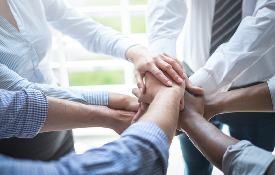 Stack of hands. Unity and teamwork concept.