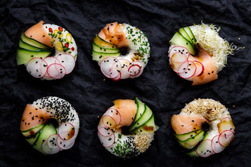 Sushi donuts on dark background. Top view.