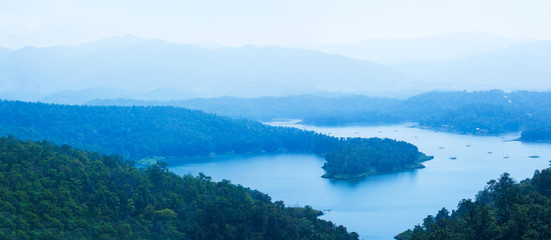 Aerial view of the blue lake and houseboat community.