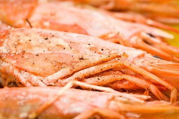 grilled shrimps with lemon juice and olive oil - fresh seafood dish 