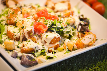 different mix salad - fresh food, vegetables, proteins, fruits, dressing, nuts