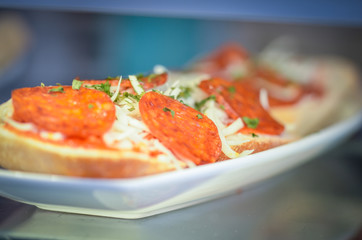 different mix salad - fresh food, vegetables, proteins, fruits, dressing, nuts