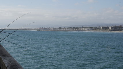 Oceanside Pier California with beach coastline and fishing rods shot in high resolution 